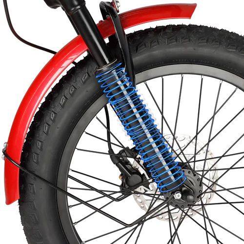 Front wheel of electric trike with fat tire, disc brake, and blue suspension, red fender