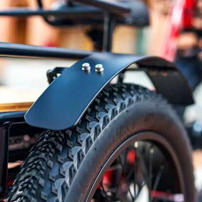 Close-up of fat tire and fender on a heavy-duty electric trike
