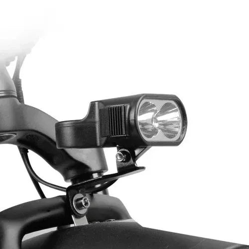 Close-up of front LED headlight on Turbo Trikes electric trike for safe night riding