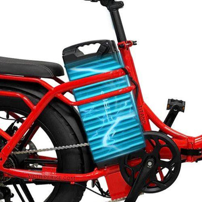 Red electric trike with visible battery pack, sturdy frame, and fat tire near the pedal area.