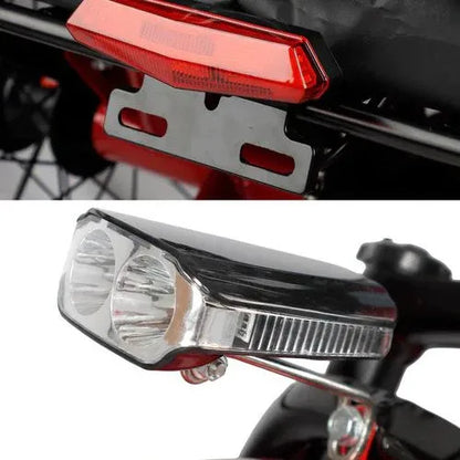 Front and rear LED lights on a Turbo Trikes electric trike for visibility and safety
