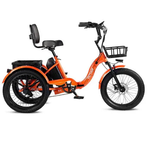 Orange electric trike with fat tires, rear basket, and upright seat from Turbo Trikes